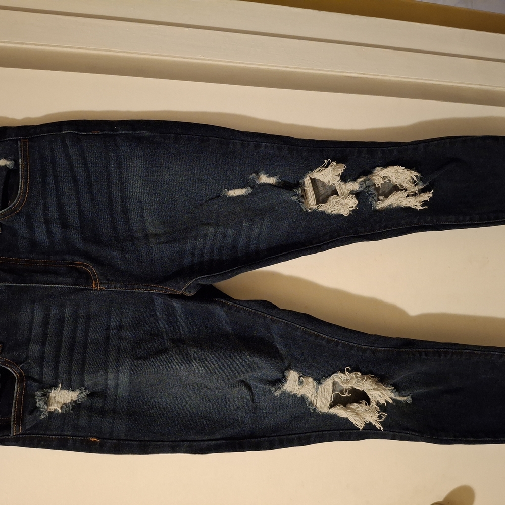 Distressed Dark Blue Jeans